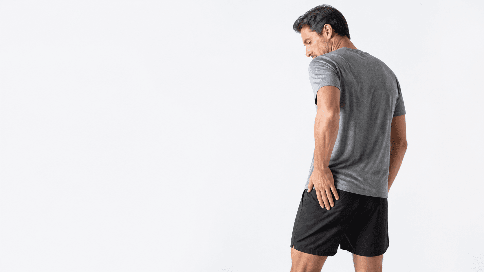 Person resting a hand on the outer hip