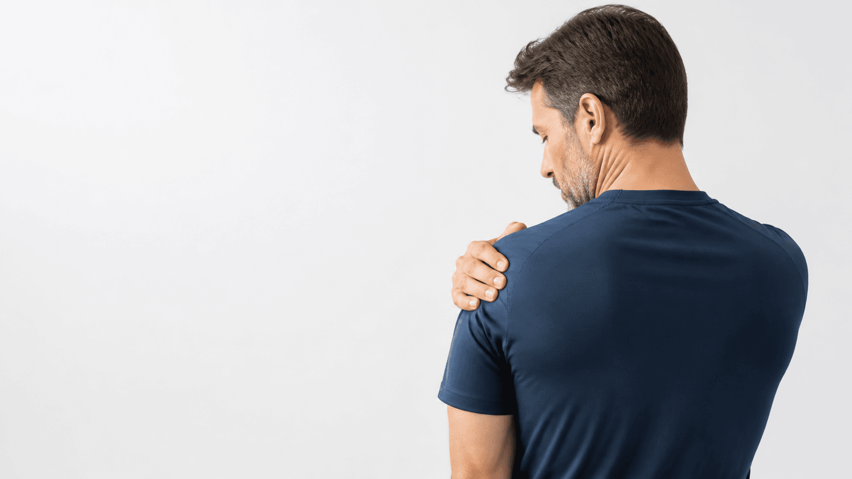 Person resting a hand on the outer upper shoulder